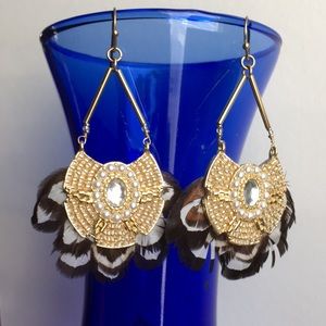 Gold tone earrings with quail feathers. Center gem, tiny pearls & clear beads.